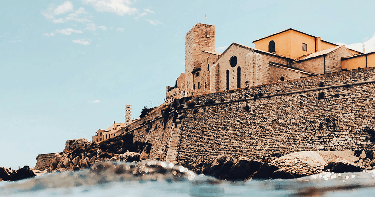Coastal view of the French Riviera with hilltop villages above the Mediterranean