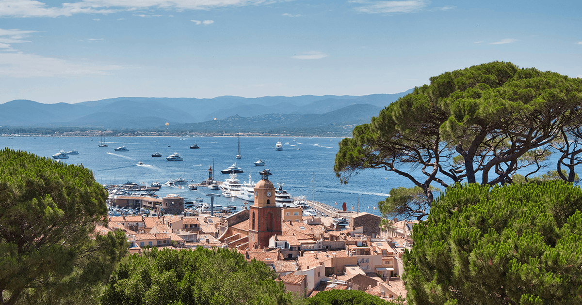 Saint-Tropez old port with fishing boats and pastel waterfront buildings